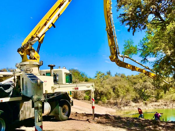 Large equipment helping with the construction of a new lake