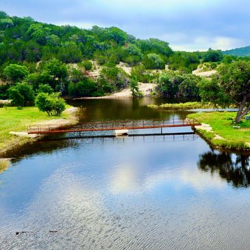 Beautiful lake bridge designed and created by 3R Sodbusters.