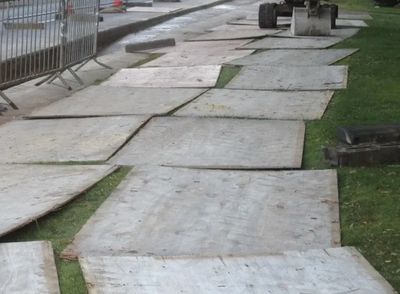 Site preparation with ground protection mats for excavation and landscaping work in Nanaimo, BC.