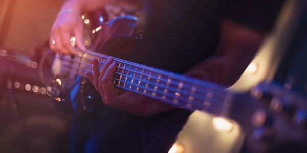 A person playing the guitar