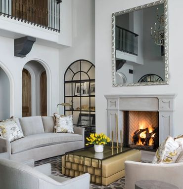 Custom arched display cabinetry made with aluminum. The entire front glass bi-folds outward to revea