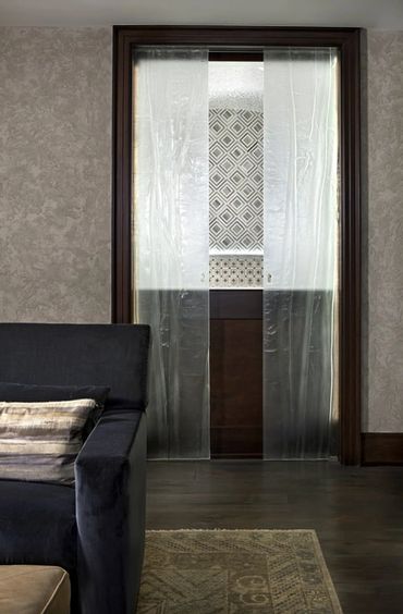 Melt down glass Arizona flowing linen French glass doors. installation in orchard Lake Michigan.