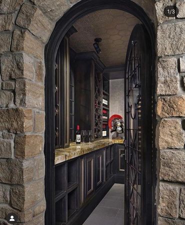 Wine cellar made of patina steel and brass cabinetry wine storage climate controlled cellar
Custom