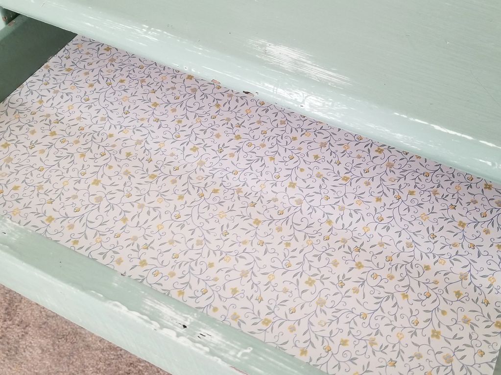 shabby chic wood side table in seafoam green with french wall paper lined drawer