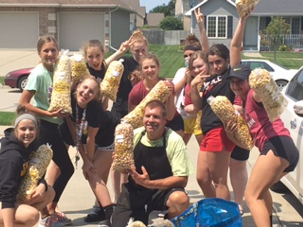 Jeff E Pop with sports team special popcorn sales event