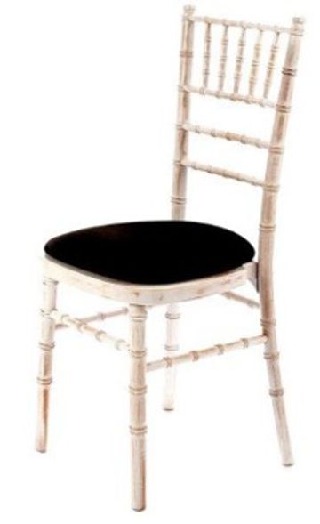 chiavari ladderback chair in washed ivory with black velvet padded seatpad