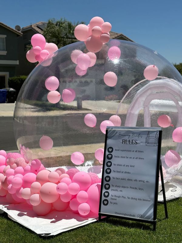 8 ft in diameter bubble house adorned with pink balloons