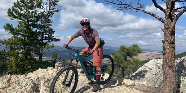 Lynn Foster, co-owner of A7 Cycles bike repair, riding in Helena, Montana