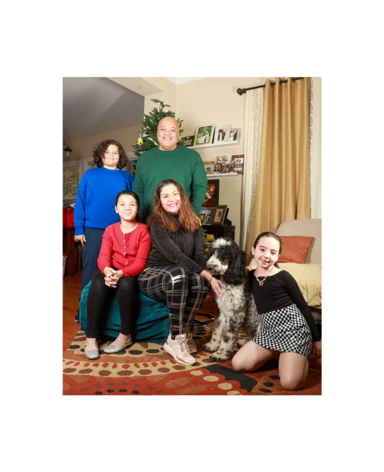 April and her beautiful family Winter 2024.