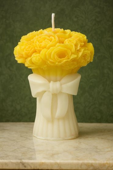Decorative candle shaped like a bouquet with a yellow flower top and white bow base.