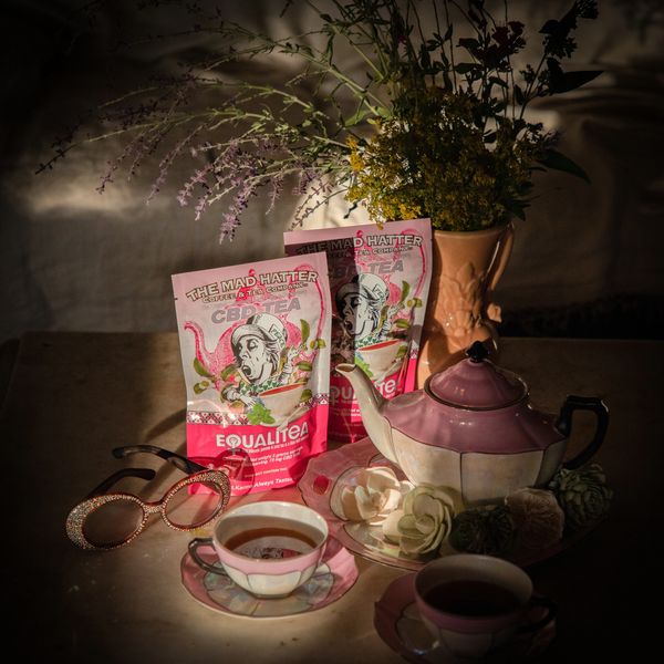Pink and white teapot with granny glasses and flowers