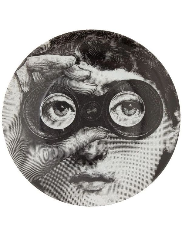lady looking through looking glass turn of the century illustration black and white.