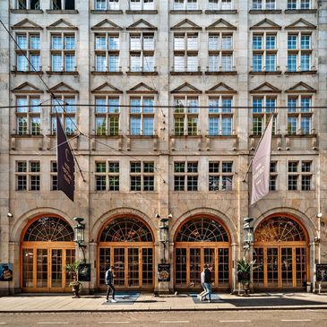 Oslo hotspot, historic theater, rich hues, dramatic legacy