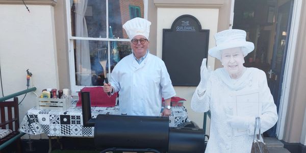 Chef preparing the BBQ outside the pub