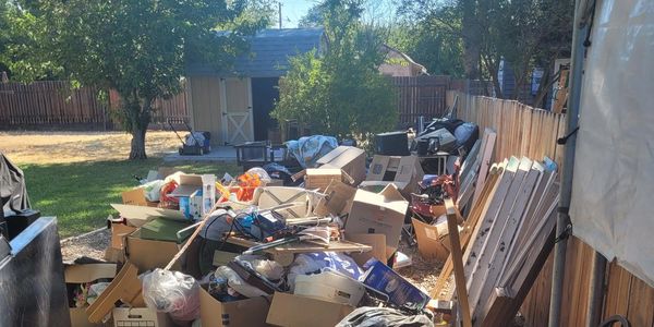 alt="Junk removal in Crestline California backyard cleanout"