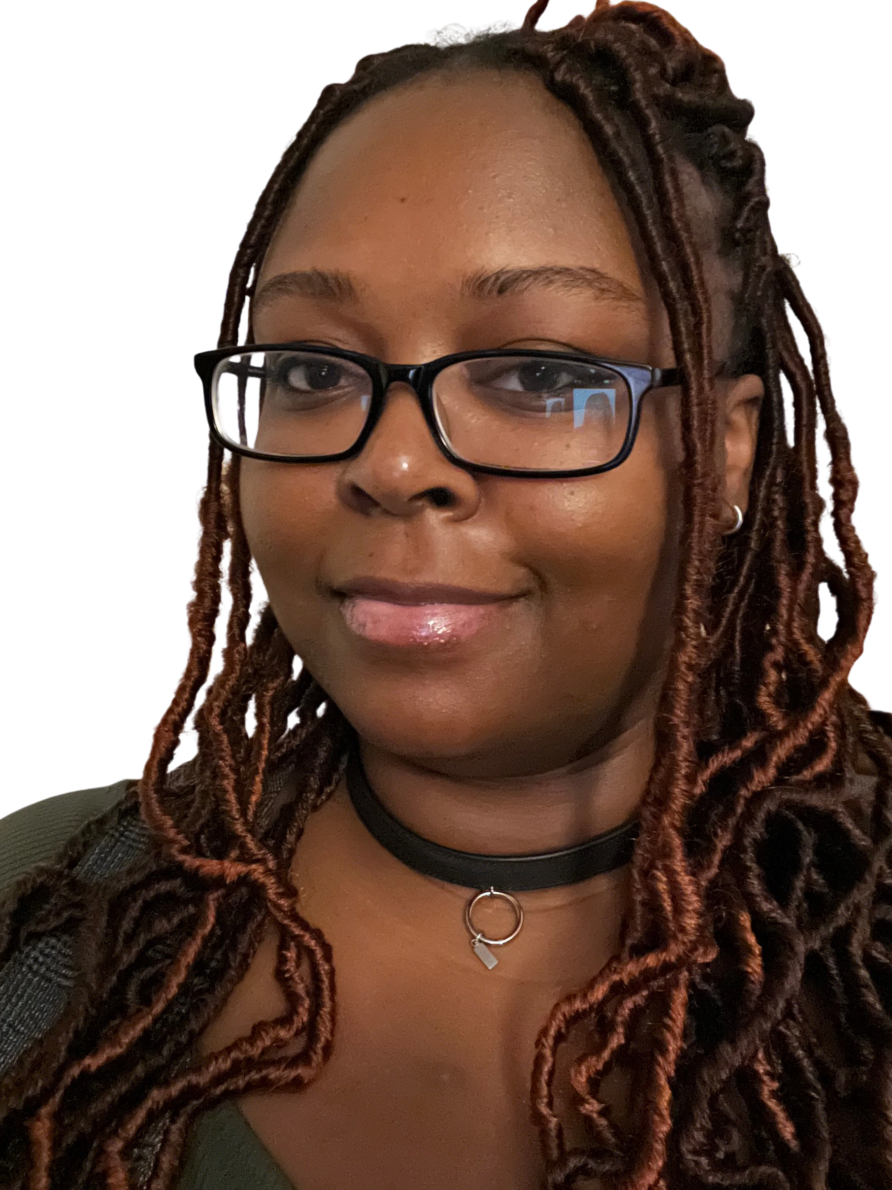 Woman with glasses and braided hair, smiling gently.
