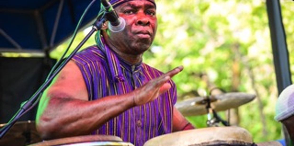 Onye Onyemaechi performing on drums.