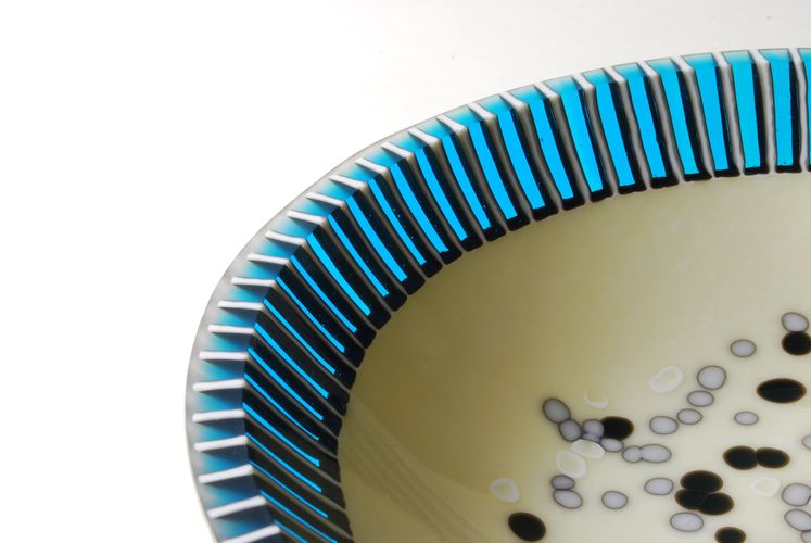 "Intersticies" detail
10-1/2in diameter x 2-3/4in high x 1/2in thick