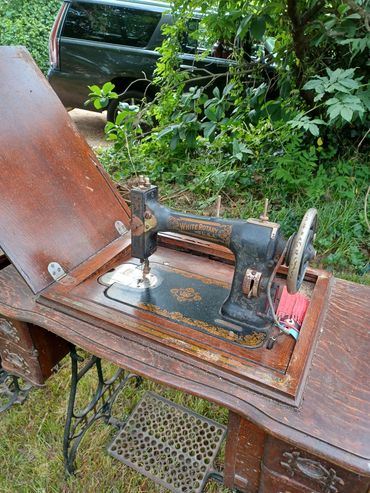 Circa 1901 sewing machine in cabinet. $150