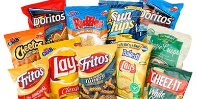 Assortment of popular snack chips including Doritos, Lay's, Fritos, Cheez-It, and more.