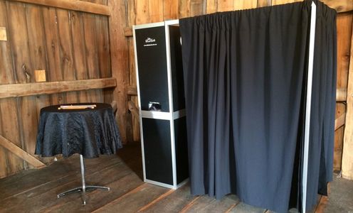 little black booth photo booth rental set up at party in Grand Rapids
