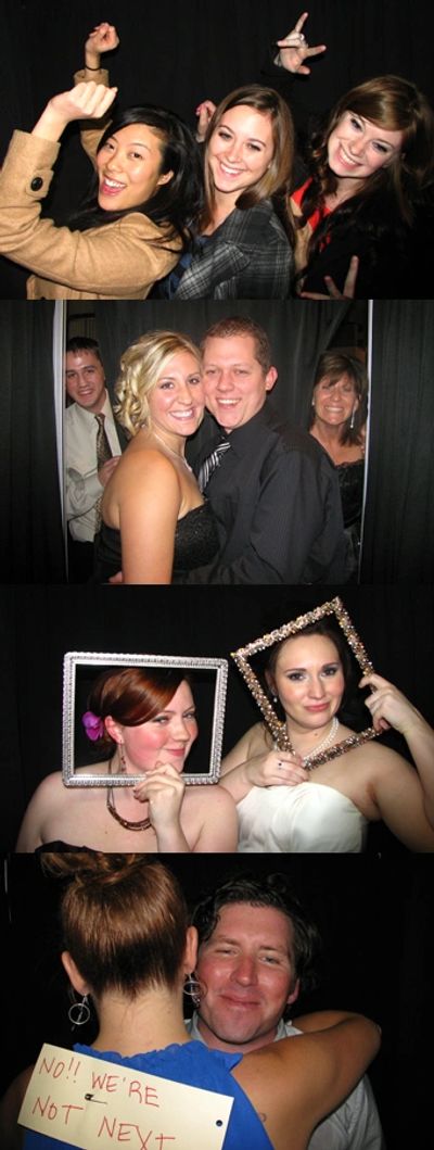 Guests using the Little Black Booth Photo Booth during a rental in Grand Rapids