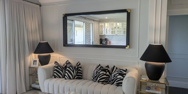 Custom feature wall wainscoting to frame beds, fireplaces and TV areas with clean details