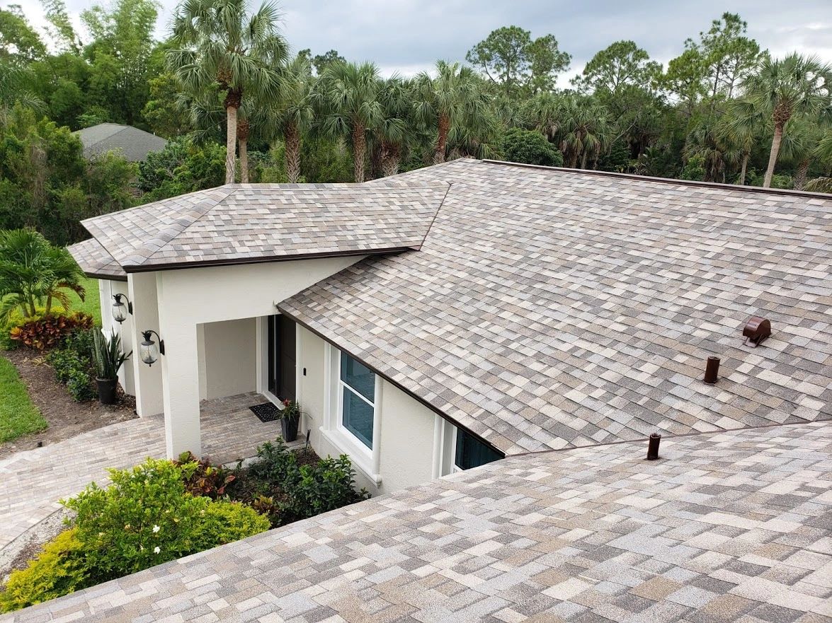 Roof with Owens Corning Duration shingles installed in the color Sand Dune