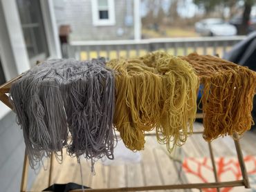 A few natural dyes drying on the porch by the sea