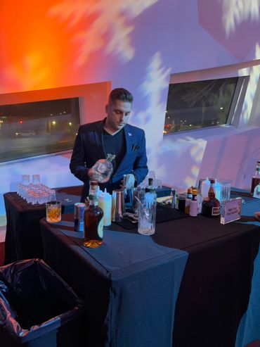 Giambrone at the demo station teaching people to make Old Fashions and Margaritas.