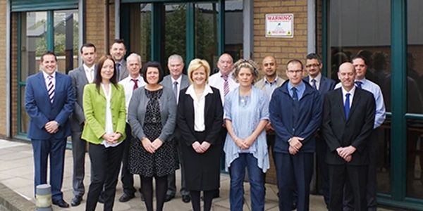 Staff outside building