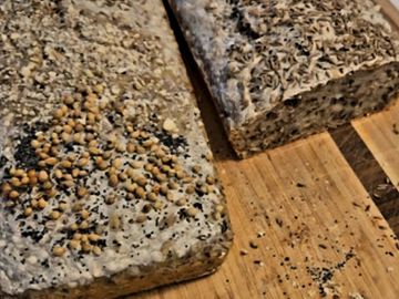 Wheat flour, bread starter, carraway, sunflower seeds, flaxseeds, salt, sugar, water