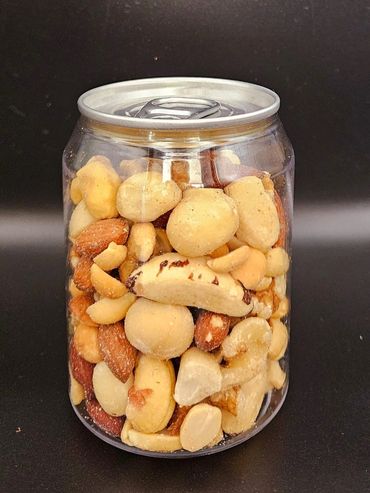 Clear jar shaped like a soda can filled with mixed nuts.