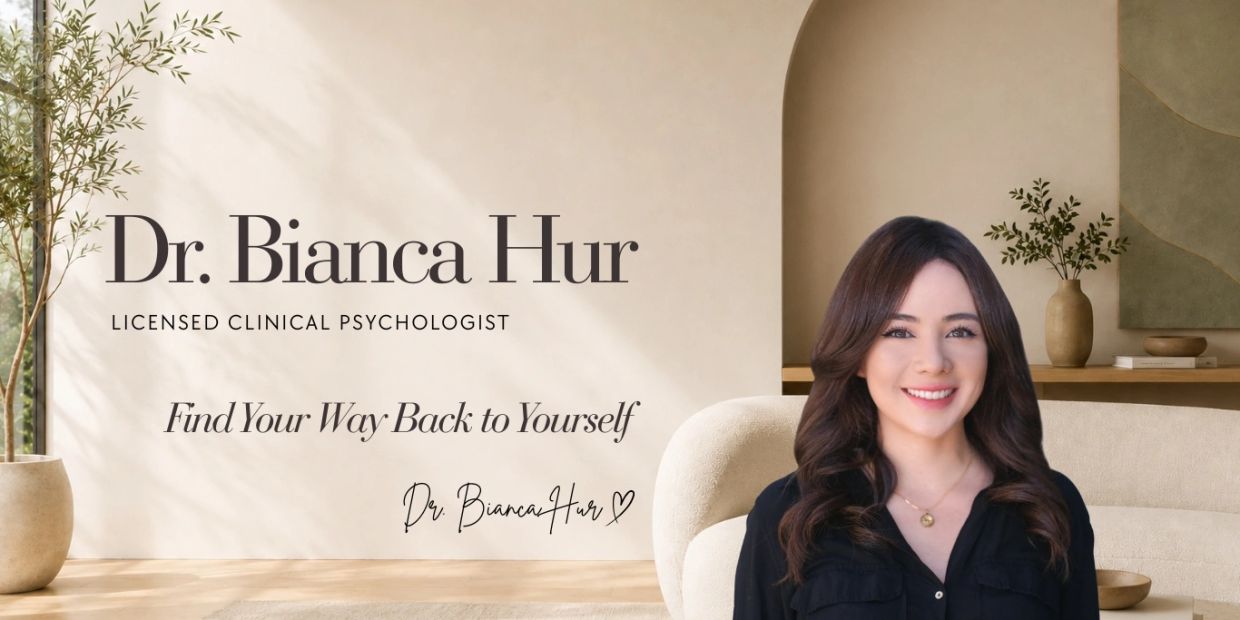 Dr. Bianca Hur, licensed clinical psychologist, smiling in a cozy setting.