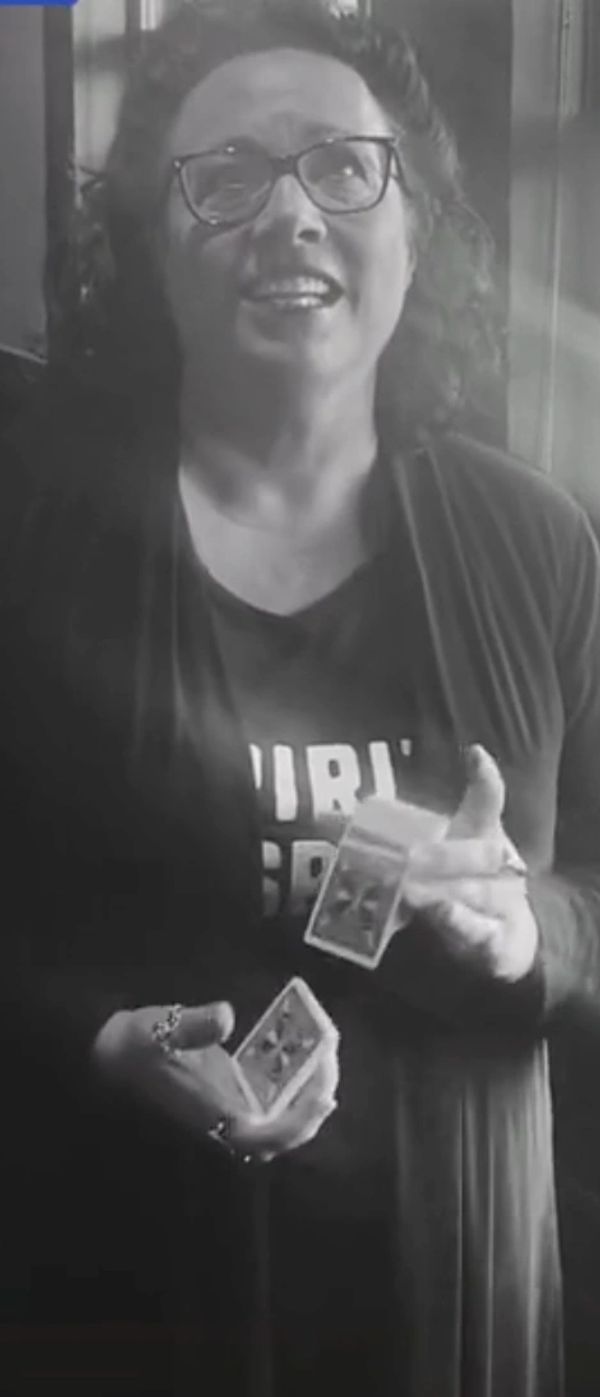 Sarah Paige Medium working with cards for a psychic reading