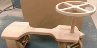 Cherry child's ride-on town car toy with "noise maker" wheels