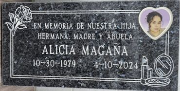 Memorial plaque dedicated to Alicia Magaña with dates and a photo.