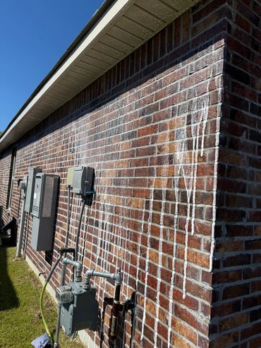 A sparkling clean home after a full soft wash using Ian’s Secret Sauce. The brick, stucco, and wood