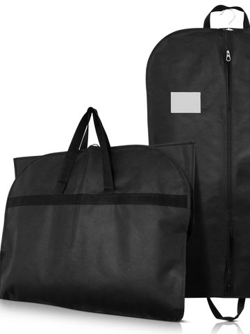 Two black garment bags, one standing and one laying down.