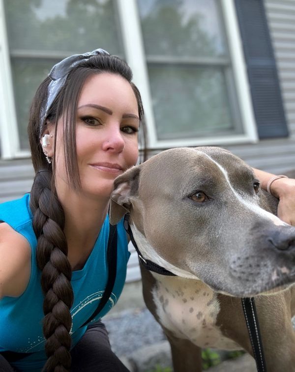 Dog Walker & Large gray dog in Beacon NY
