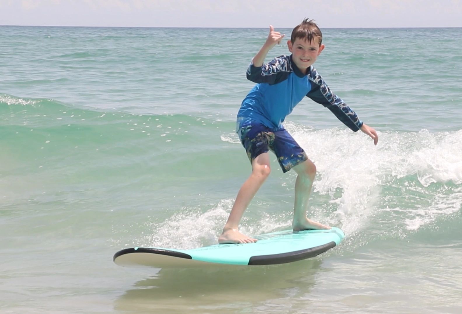 This is Kamden with his first Surfing Lesson in Daytona Beach Shores making it look too easy.