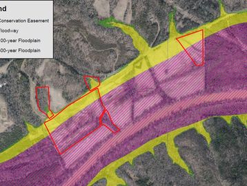 Map showing floodplain zones and conservation easements with red boundaries.