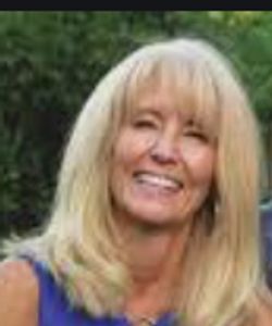 Debbie gave a testimony. This is her smiling brightly in a happy engagement photo