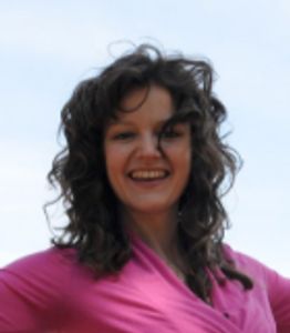 Lovely Lauren also gave a testimony. She is smiling beautifully outside with the wind behind her.