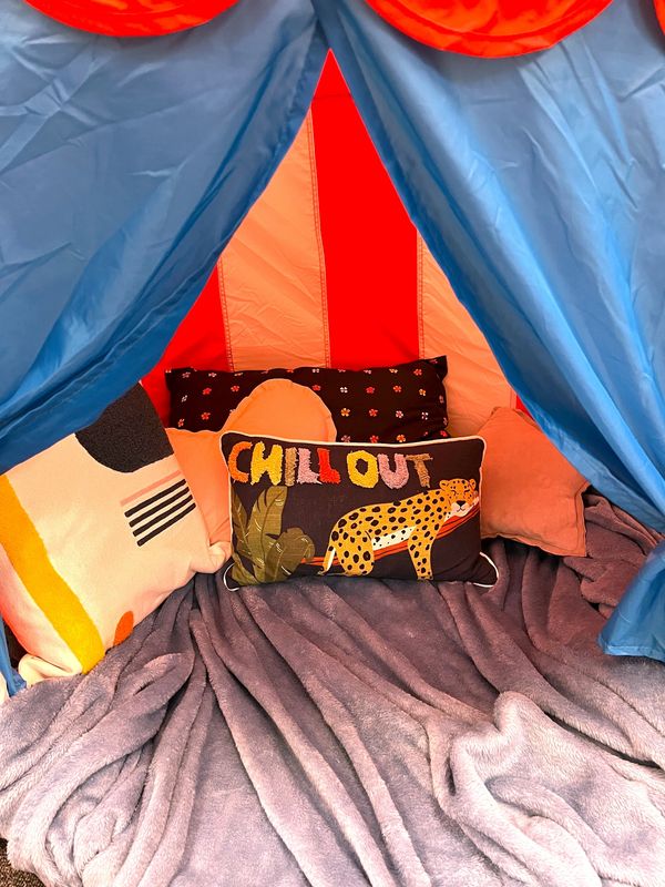 play tent with pillows and blankets