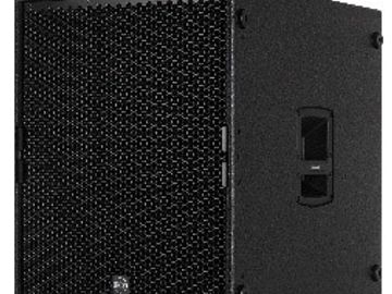 Black professional speaker with mesh grille.