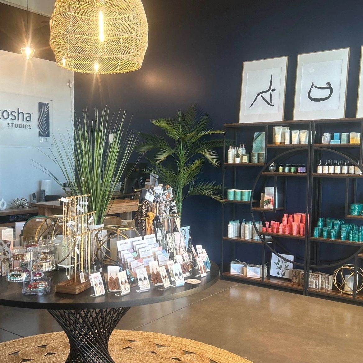 Modern beauty and wellness store with jewelry and skincare products.
