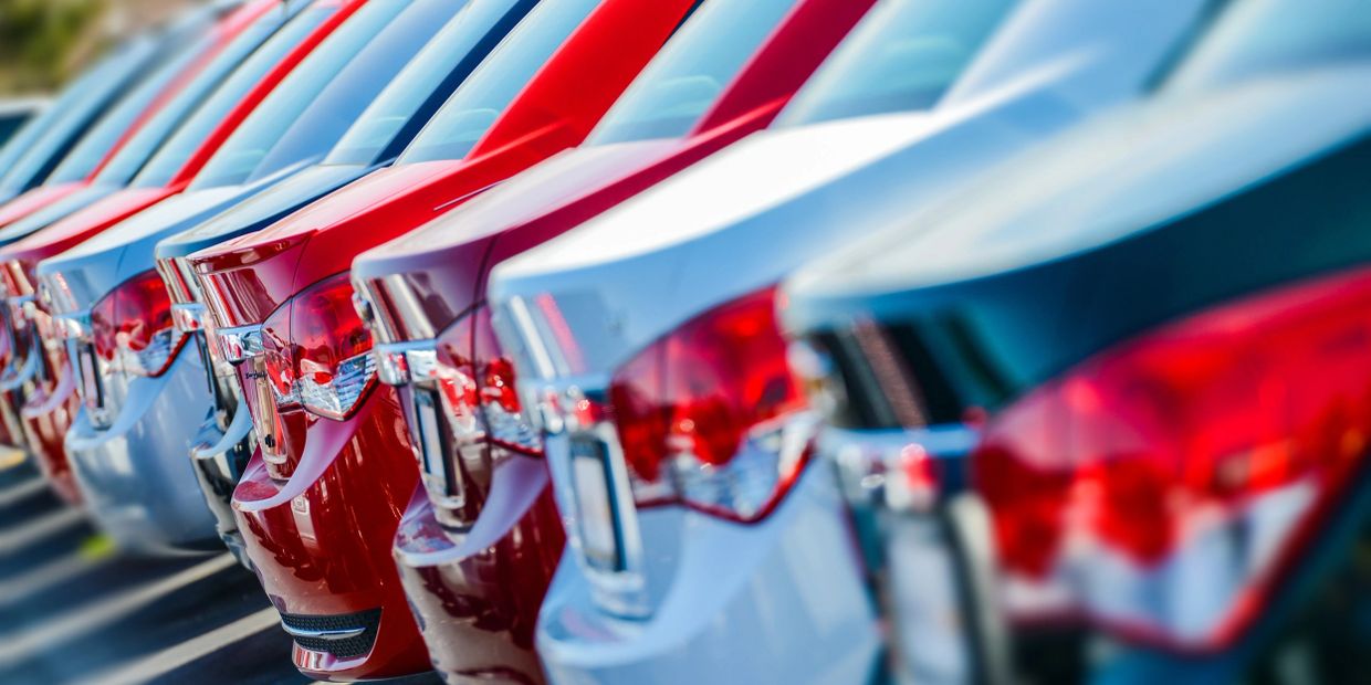 Cars lined up in yard storage