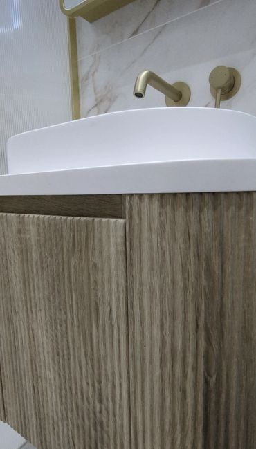 fluted wood bathroom furniture in modern bathroom