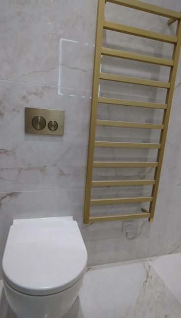 brushed brass and marble in bathroom